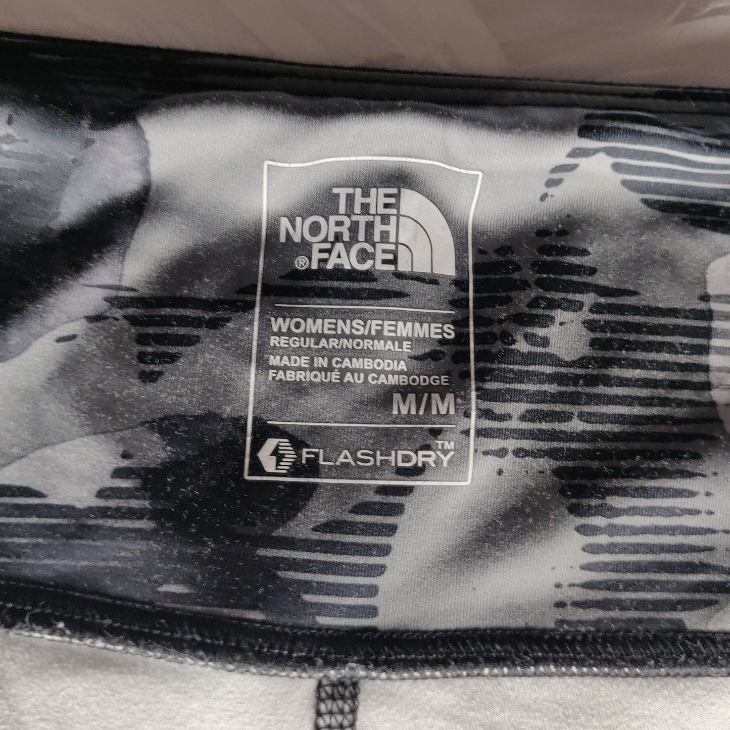 The North Face Flash Dry Mid Rise Black Grey Floral Capri Leggings Women Medium